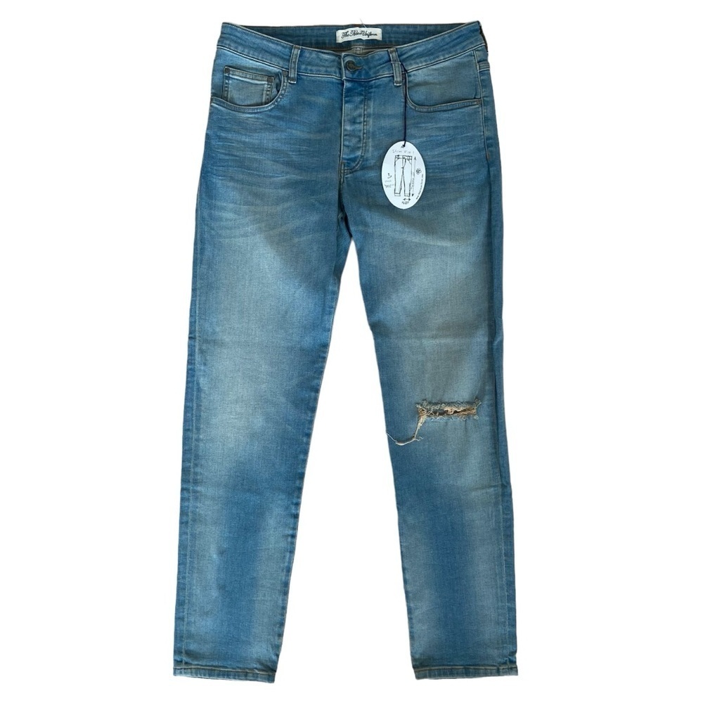 The blue Uniform men jeans NWT button fly tapered leg mid- waisted ripped 36/32